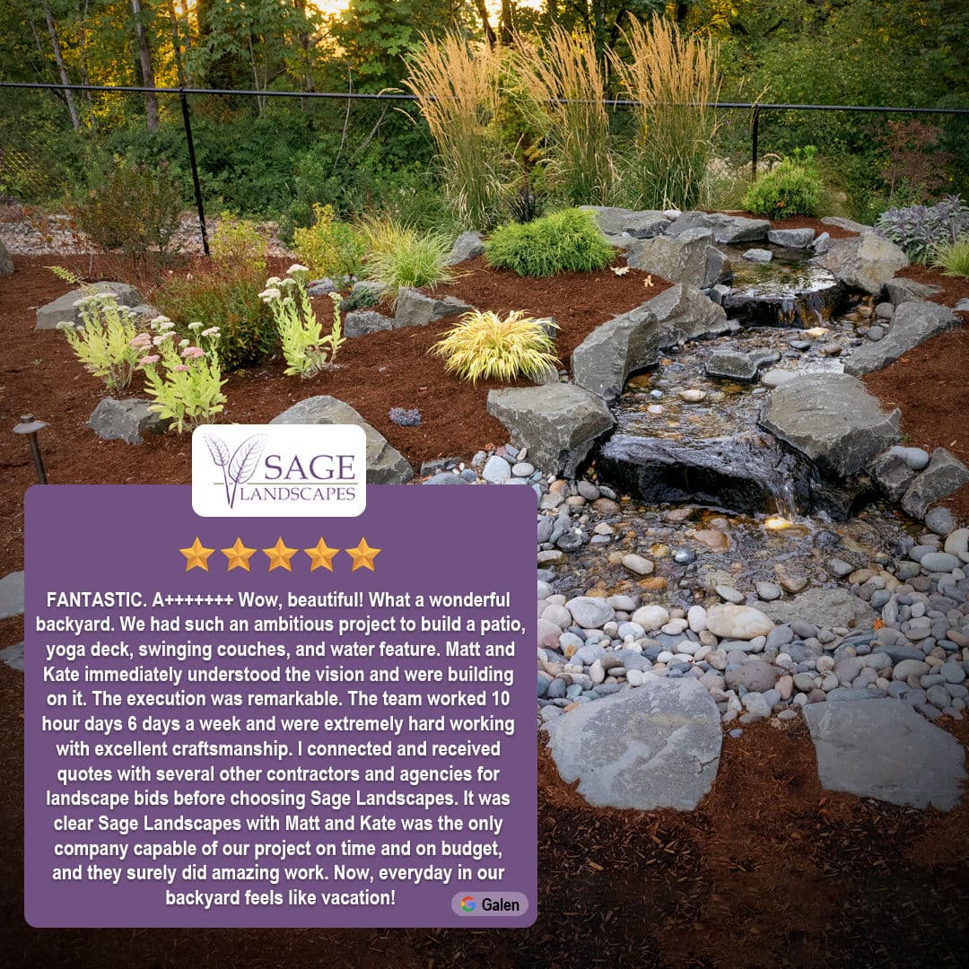 Landscape design featuring a serene rock water feature and patio by Sage Landscapes.