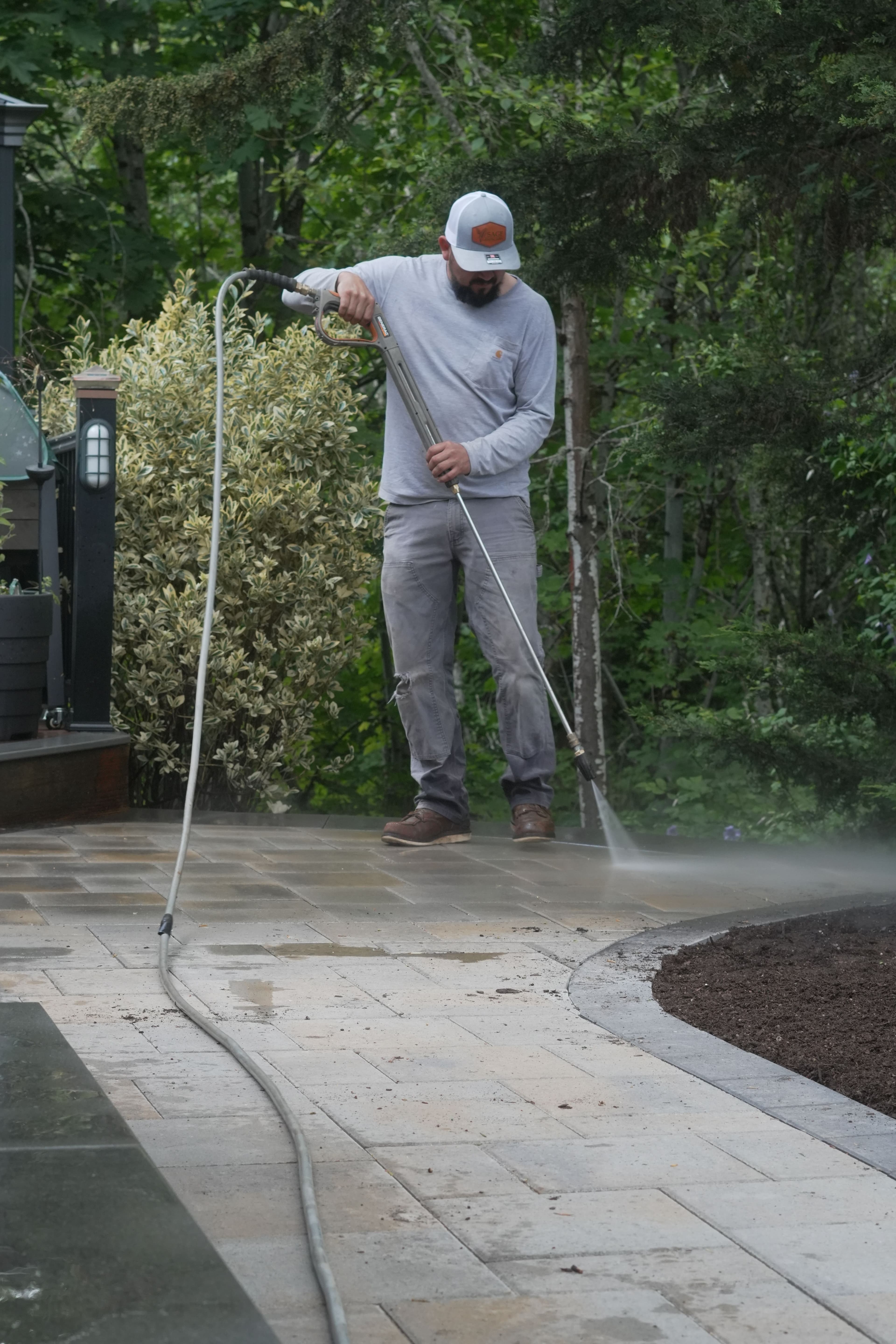 Project Paver Side Yard and Retaining Wall With Privacy Shrubs image